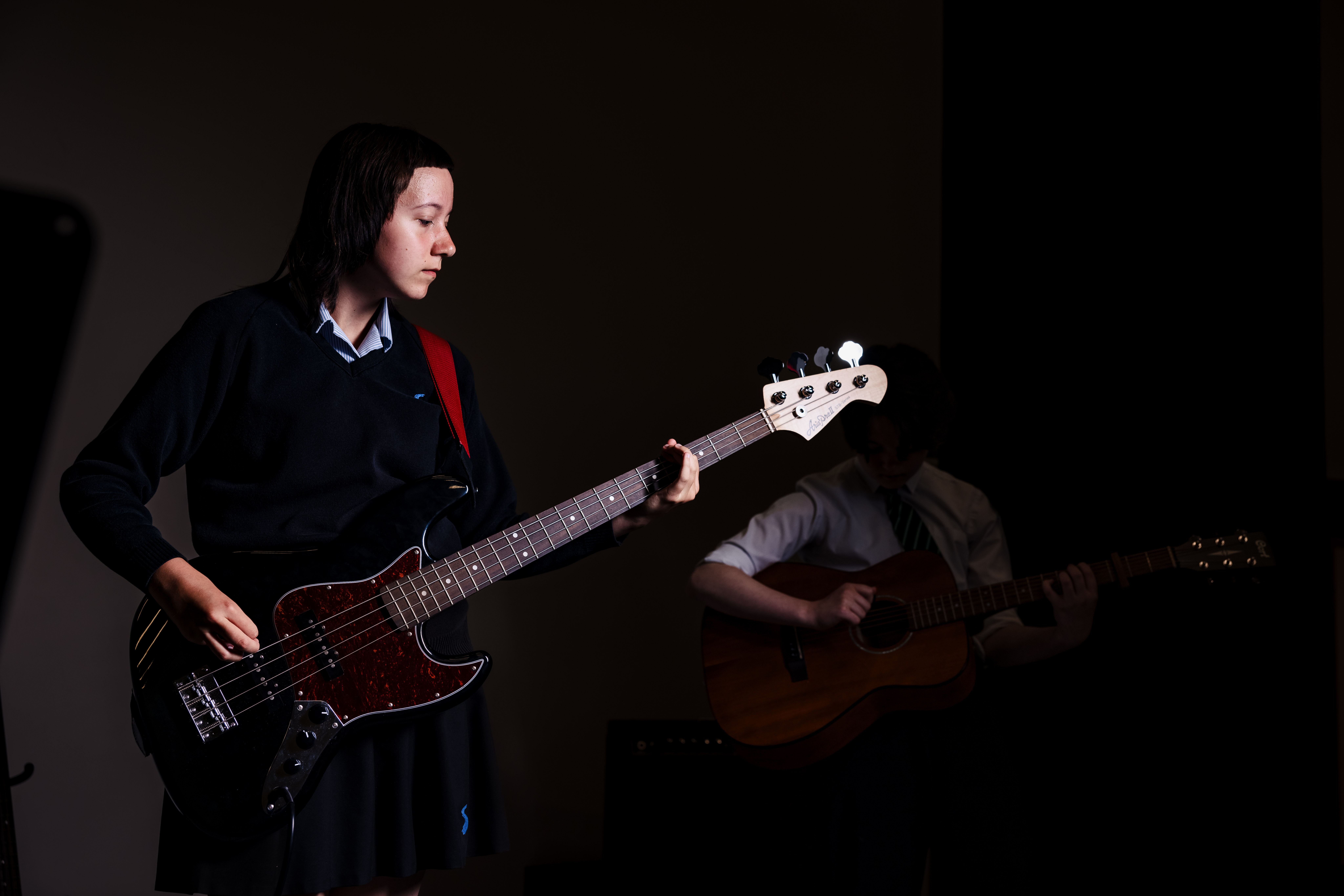 Student playing guitar